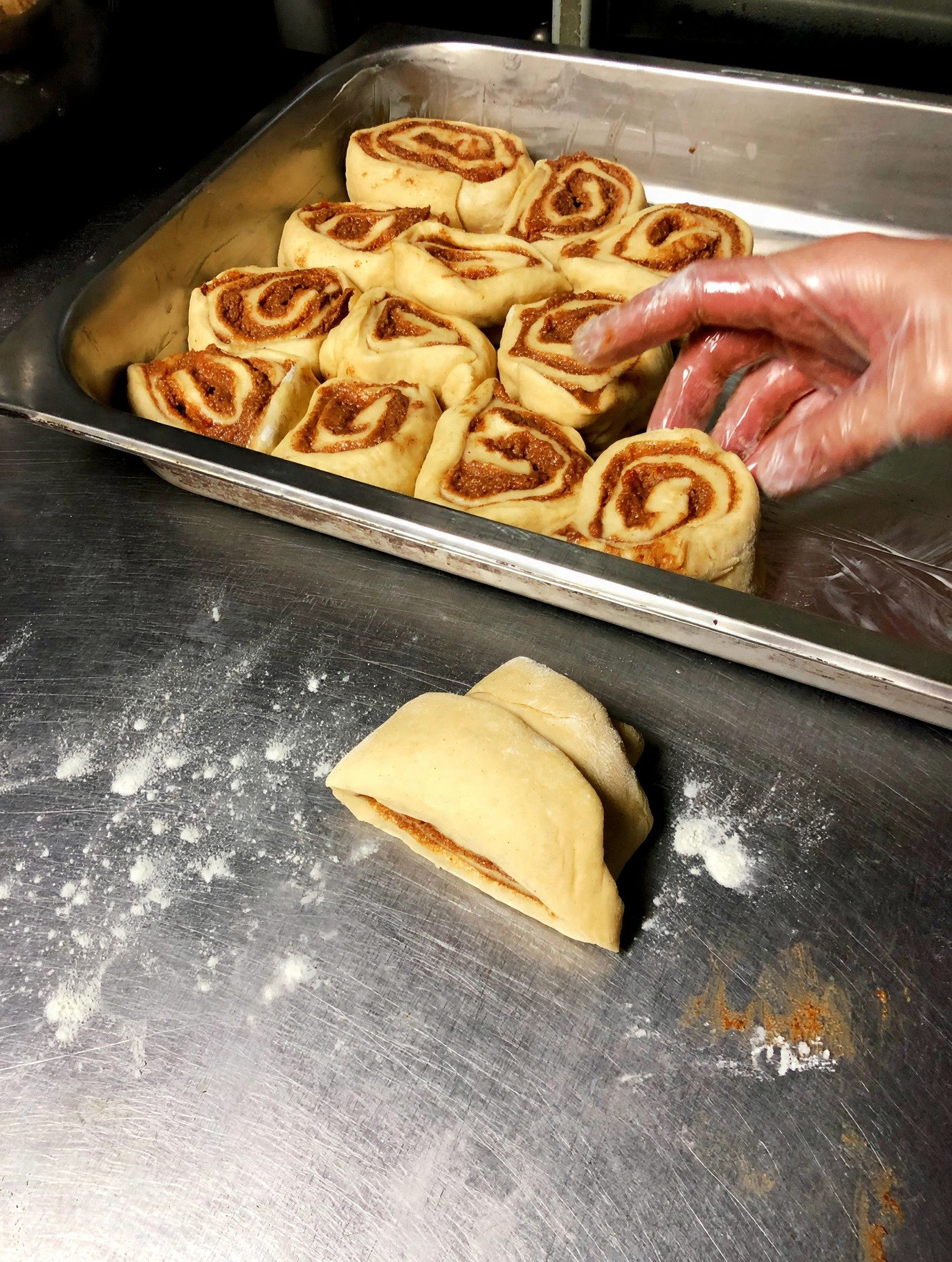 Fresh cinnamon rolls prepped in the kitchen