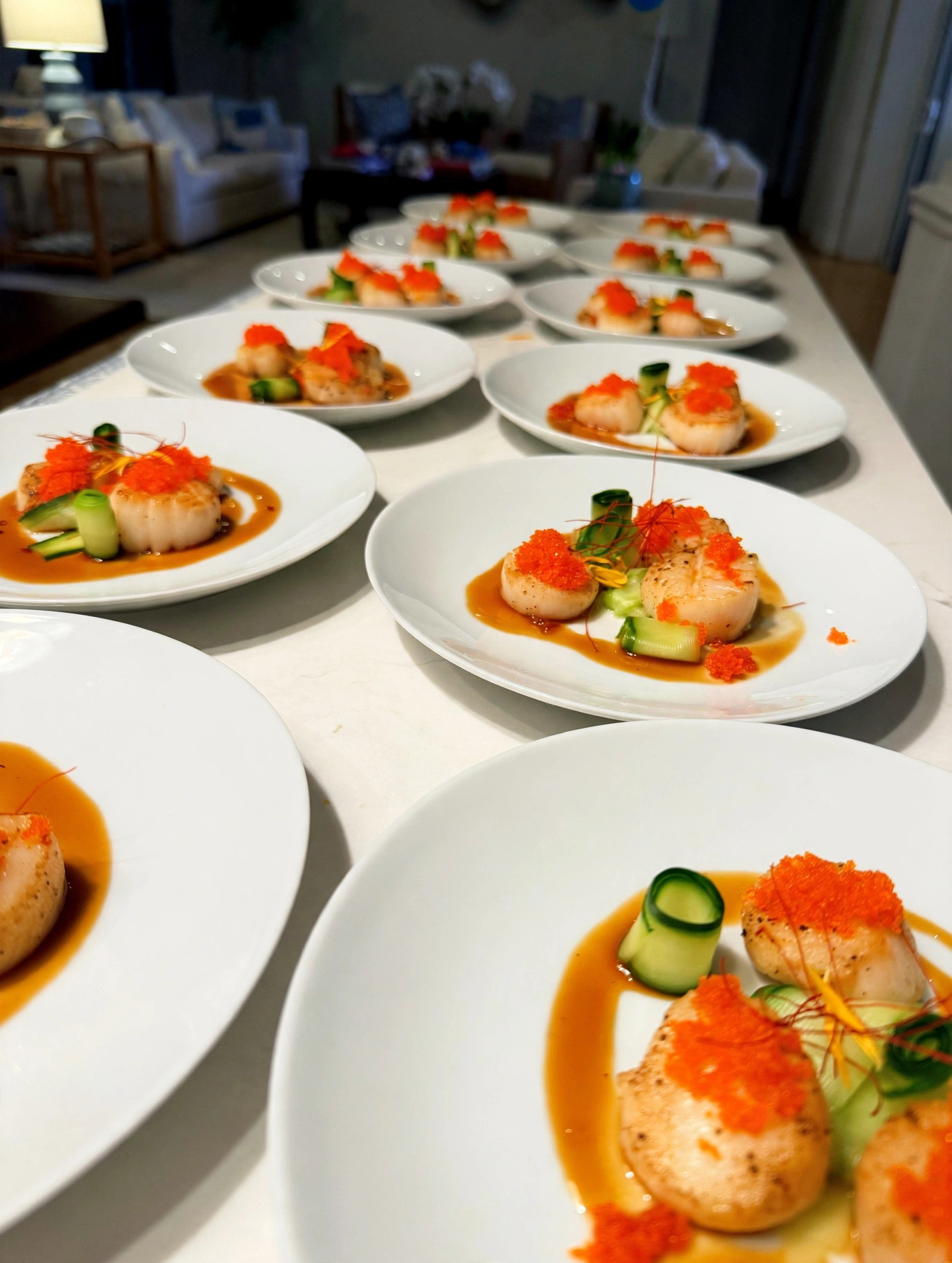 Seared scallop course, plated for the table