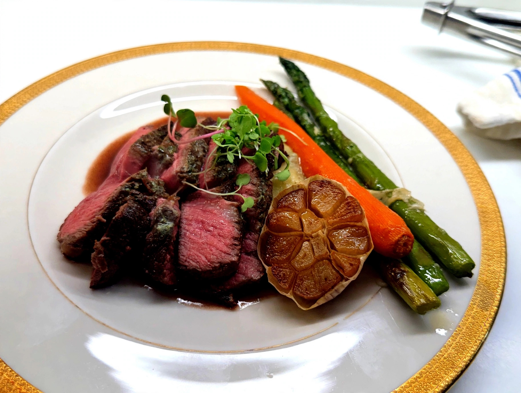 Sliced beef tenderloin plated by Chef Tony
